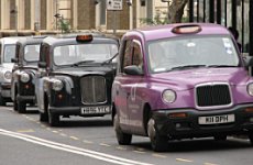 Black Taxi Invasion over Minicab Rank.