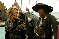 Elizabeth Swan (Keira Knightley), and Captain Barbossa (Geoffrey Rush) in Pirates Of The Caribbean: At World's End. Photographer: Peter Mountain. © Disney Enterprises, Inc. All Rights Reserved.