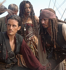 Will Turner (ORLANDO BLOOM), Tia Dalma (NAOMIE HARRIS), and Captain Jack Sparrow (JOHNNY DEPP) in Pirates Of The Caribbean: At World's End. Photographer: Stephen Vaughan. © Disney Enterprises, Inc. All Rights Reserved.