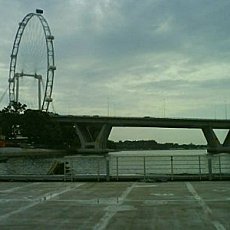 Benjamin Sheares Bridge and the Singapore Flyer. Photo Credit:  Aranho