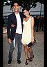 Dev Patel and Freida Pinto dressed in Burberry arrive at the Burberry Prorsum Spring/Summer 2010 Show at Rootstein Hopkins Parade Ground during London Fashion Week on September 22, 2009 in London, England. (Photo by Getty Images/Getty Images for Burberry)