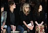 Douglas Booth, Twiggy and Lee Na Young watch from the front row at the Burberry Prorsum Spring/Summer 2010 Show at Rootstein Hopkins Parade Ground during London Fashion Week on September 22, 2009 in London, England. (Photo by Getty Images/Getty Images for Burberry) 