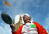 Lord McNally limbers up for the annual Rehab Parliamentary Pancake Race