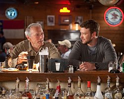 Trouble with the Curve Competition. CLINT EASTWOOD as Gus and JUSTIN TIMBERLAKE as Johnny in Trouble with the Curve. Photo Credit: Keith Bernstein. Copyright: (C) 2012 WARNER BROS. ENTERTAINMENT, INC.