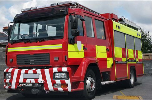 Firefighters extract man's manhood from toaster. Copyright: LondonNet/BANG