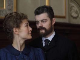 Rosamund Pike as Marie Curie and Sam Riley as Pierre Curie in Radioactive, directed by Marjane Satrapi. Photo: Laurie Sparham. Copyright: StudioCanal. All Rights Reserved.