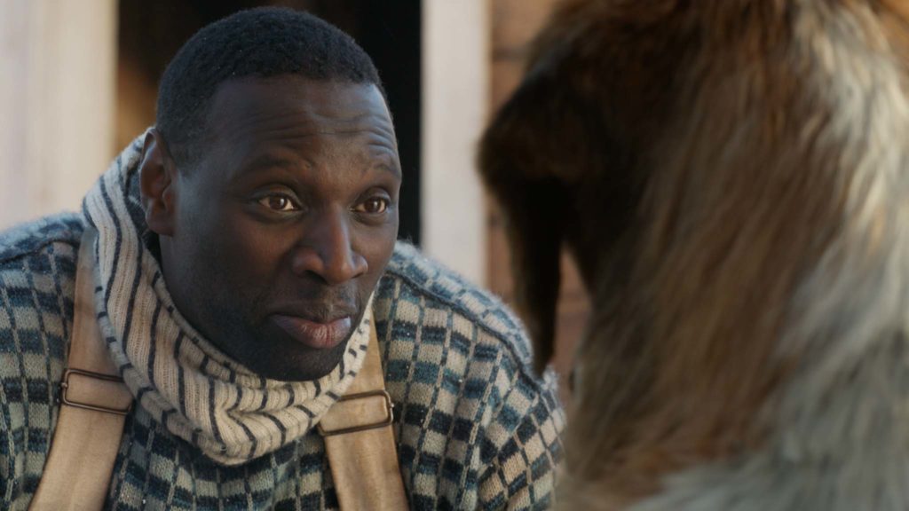 Omar Sy as Perrault and Buck in The Call Of The Wild, directed by Chris Sanders. Photo: courtesy Twentieth Century Fox Film Corporation. Copyright: 2019 Twentieth Century Fox Film Corporation. All Rights Reserved.