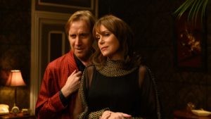 Rhys Ifans as Eric Morley and Keeley Hawes as Julia Morley in Misbehaviour, directed by Philippa Lowthorpe. Photo: Parisa Taghizadeh. Copyright: Pathe Productions Ltd. All Rights Reserved.