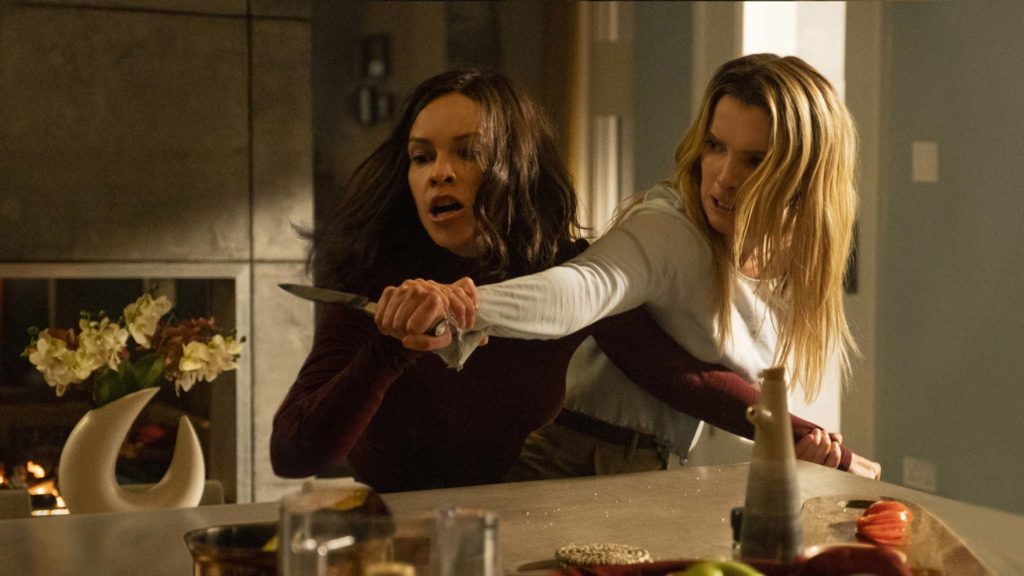 Hilary Swank and Betty Gilpin in The Hunt, directed by Craig Zobel. Photo: Patti Perret. Copyright: Universal Pictures. All Rights Reserved.