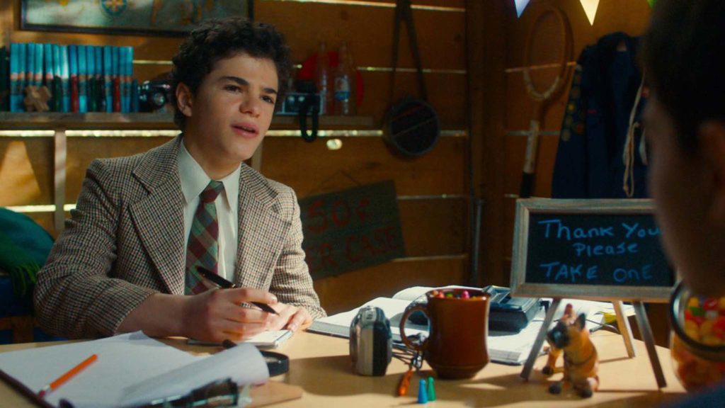 Jesse Noah Gruman as young Abe Applebaum in The Kid Detective, directed by Evan Morgan. Copyright: Sony Pictures Releasing. All Rights Reserved.