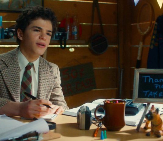 Jesse Noah Gruman as young Abe Applebaum in The Kid Detective, directed by Evan Morgan. Copyright: Sony Pictures Releasing. All Rights Reserved.