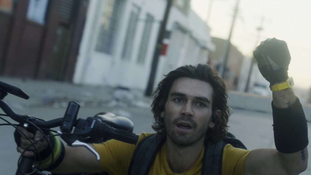 KJ Apa as Nico in Songbird, directed by Adam Mason. Copyright: 2020 STX Financing, LLC. All Rights Reserved.