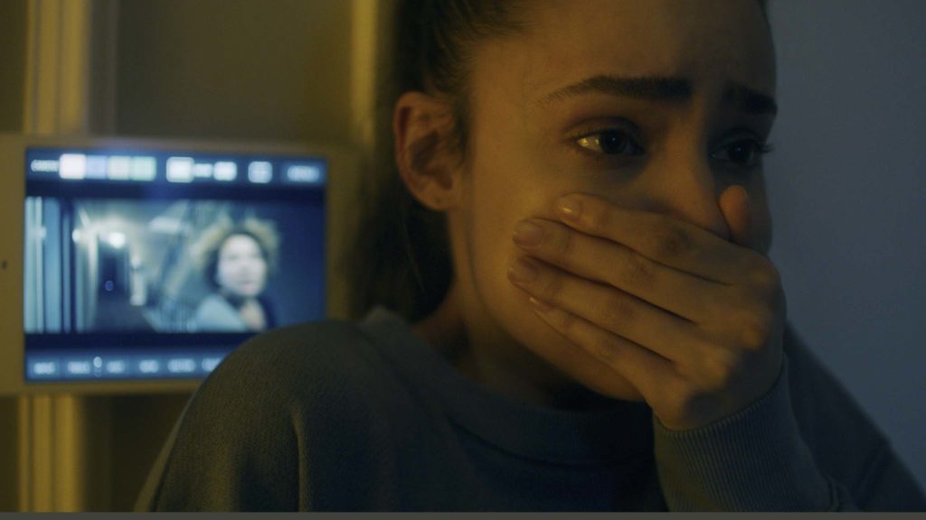 Sofia Carson as Sara in Songbird, directed by Adam Mason. Copyright: 2020 STX Financing, LLC. All Rights Reserved.
