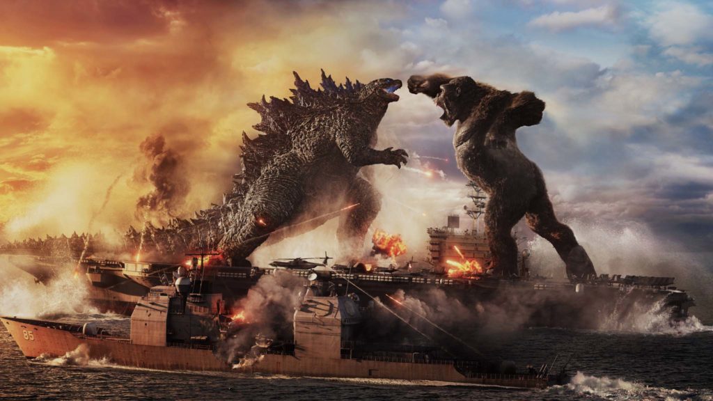 Godzilla battles Kong at sea in Godzilla Vs Kong, directed by Adam Wingard. Copyright: 2021 Legendary And Warner Bros. Entertainment Inc. Godzilla copyright Toho Co., Ltd. All Rights Reserved.