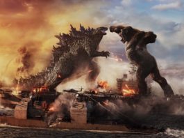 Godzilla battles Kong at sea in Godzilla Vs Kong, directed by Adam Wingard. Copyright: 2021 Legendary And Warner Bros. Entertainment Inc. Godzilla copyright Toho Co., Ltd. All Rights Reserved.