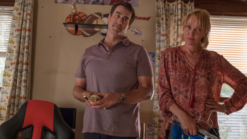 Rob Riggle as Arthur Decker and Uma Thurman as Sally Marino-Decker in The War With Grandpa, directed by Tim Hill. Photo: Ben Rothstein. Copyright: Universal Pictures. All Rights Reserved.