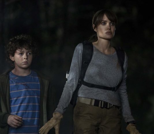 Finn Little as Connor and Angelina Jolie as Hannah in Those Who Wish Me Dead, directed by Taylor Sheridan. Photo: Emerson Miller. Copyright: 2019 Warner Bros. Entertainment Inc. All Rights Reserved.