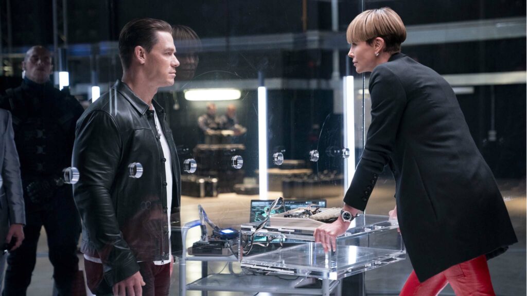 John Cena as Jakob and Charlize Theron as Cipher in Fast & Furious 9, directed by Justin Lin. Photo: Giles Keyte. Copyright: 2020 Universal Studios. All Rights Reserved.