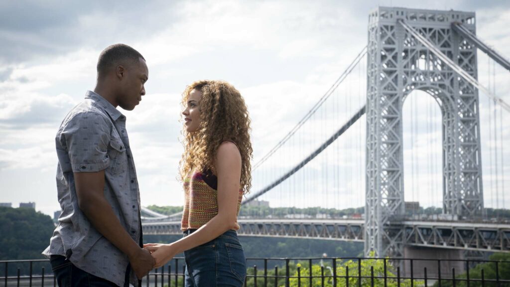 Corey Hawkins as Benny and Leslie Grace as Nina in In The Heights, directed by Jon M Chu. Photo: Macall Polay. Copyright: 2019 Warner Bros. Entertainment Inc. All Rights Reserved.