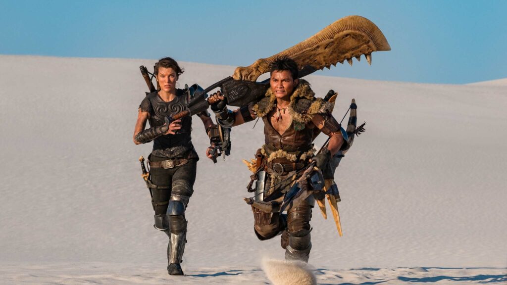 Milla Jovovich as Natalie Artemis and Tony Jaa as Hunter in Monster Hunter, directed by Paul WS Anderson. Photo: Coco Van Oppens. Copyright: Constantin Film VProduktion Services GmbH/Sony Pictures Releasing. All Rights Reserved.