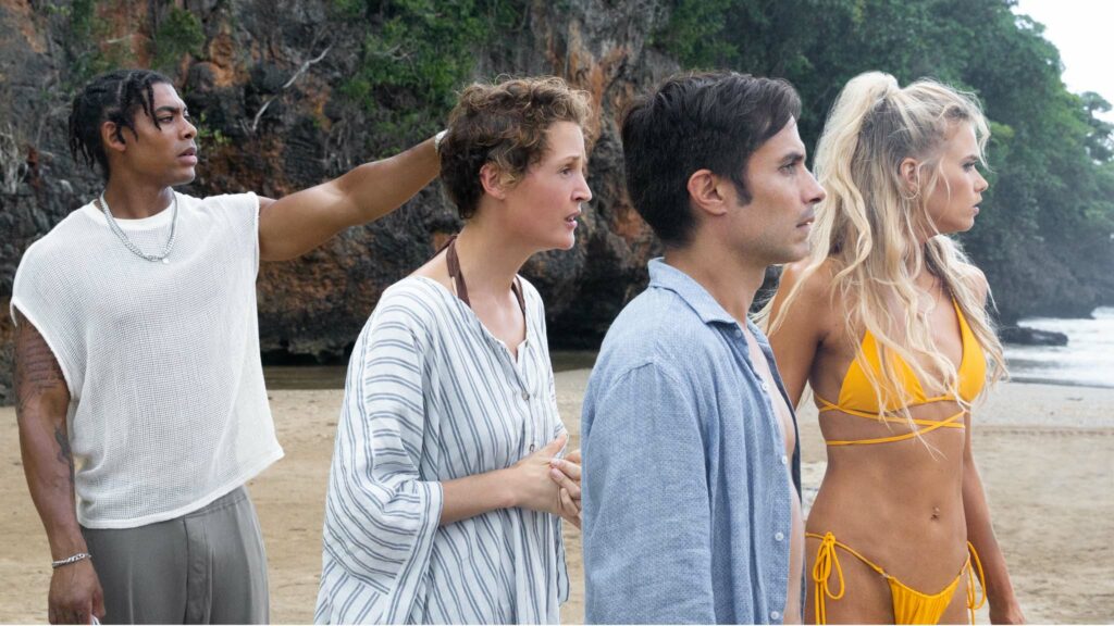 Aaron Pierre as Mid-Sized Sedan, Vicky Krieps as Prisca, Gael García Bernal as Guy and Abbey Lee as Chrystal in Old, directed by M Night Shyamalan. Photo: Phobymo. Copyright: 2021 Universal Studios. All Rights Reserved.