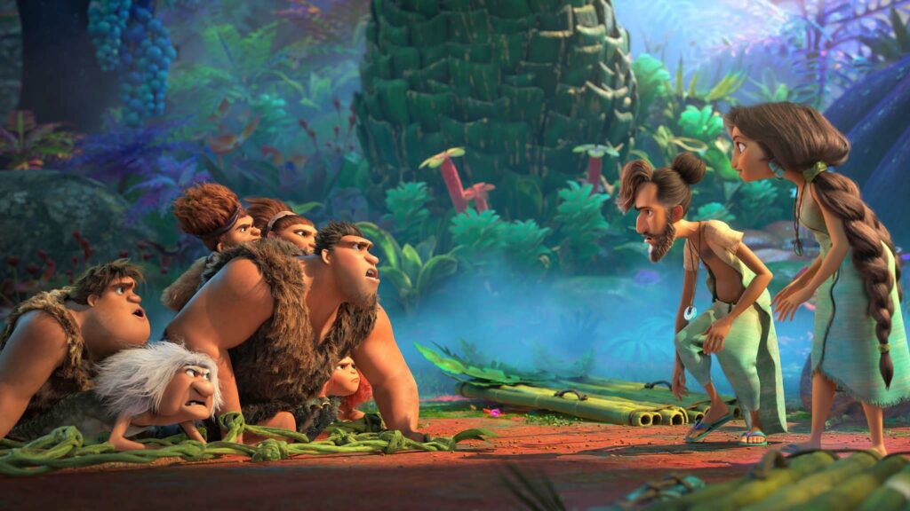 Thunk (voiced by Clark Duke), Gran (Cloris Leachman), Sandy (Kailey Crawford), Ugga (Catherine Keener), Grug (Nicolas Cage) and Eep (Emma Stone) meet Phil (Peter Dinklage) and Hope Betterman (Leslie Mann) in The Croods 2: A New Age, directed by Joel Crawford. Copyright: DreamWorks Animation LLC. All Rights Reserved.
