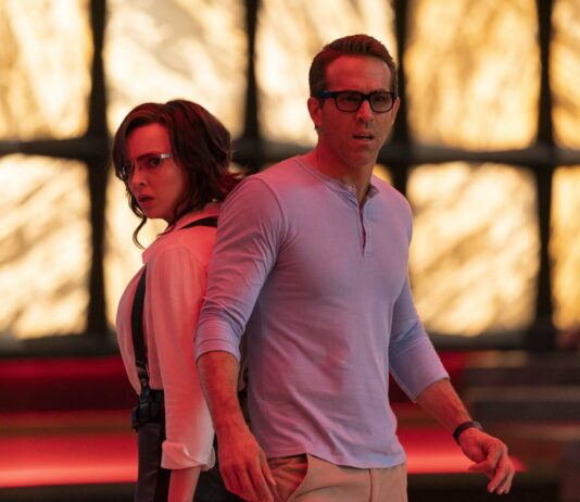 Jodie Comer as Molotov Girl and Ryan Reynolds as Guy in Free Guy, directed by Shawn Levy. Photo: Alan Markfield. Copyright: 2020 Twentieth Century Fox Film Corporation. All Rights Reserved.