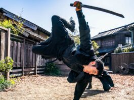 Henry Golding as Snake Eyes in Snake Eyes: G.I. Joe Origins, directed by Robert Schwentke. Photo: Niko Tavernise. Copyright: 2021 Paramount Pictures. All Rights Reserved. Hasbro, G.I. Joe and all related characters are trademarks of Hasbro. Copyright: 2021 Hasbro. All Rights Reserved.