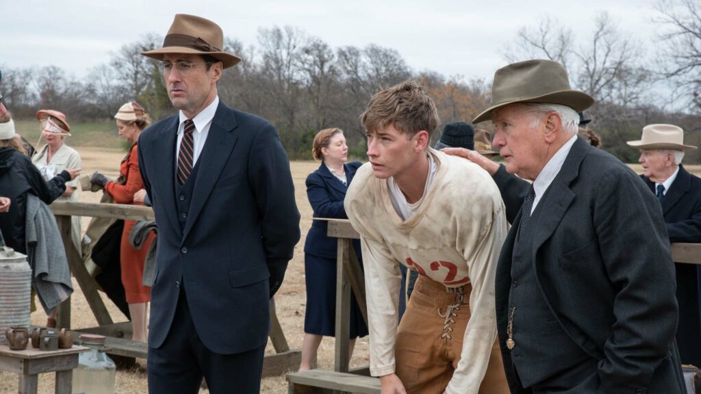 Luke Wilson as Rusty Russell, Jacob Lofland as Snoggs, Martin Sheen as Doc Hall in 12 Mighty Orphans, directed by Ty Roberts. Photo: Laura Wilson. Copyright: Santa Rita Film Co./Sony Pictures Classics. All Rights Reserved.