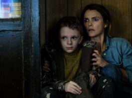 Jeremy T Thomas as Lucas Weaver and Keri Russell as Julia Meadows in Antlers, directed by Scott Cooper. Photo: Kimberly French. Copyright: 20th Century Studios. All Rights Reserved.