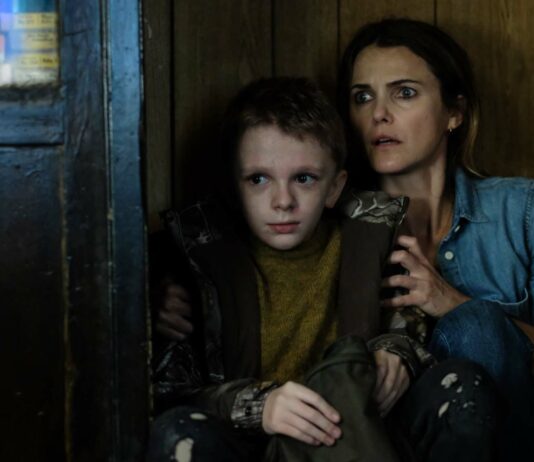 Jeremy T Thomas as Lucas Weaver and Keri Russell as Julia Meadows in Antlers, directed by Scott Cooper. Photo: Kimberly French. Copyright: 20th Century Studios. All Rights Reserved.