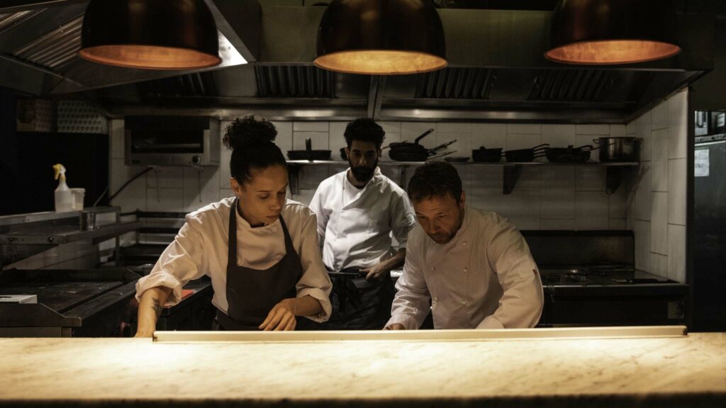Vinette Robinson, Ray Panthaki and Stephen Graham in Boiling Point, directed by Philip Barantini. Photo: Christian Black. Copyright: Vertigo Releasing. All Rights Reserved.