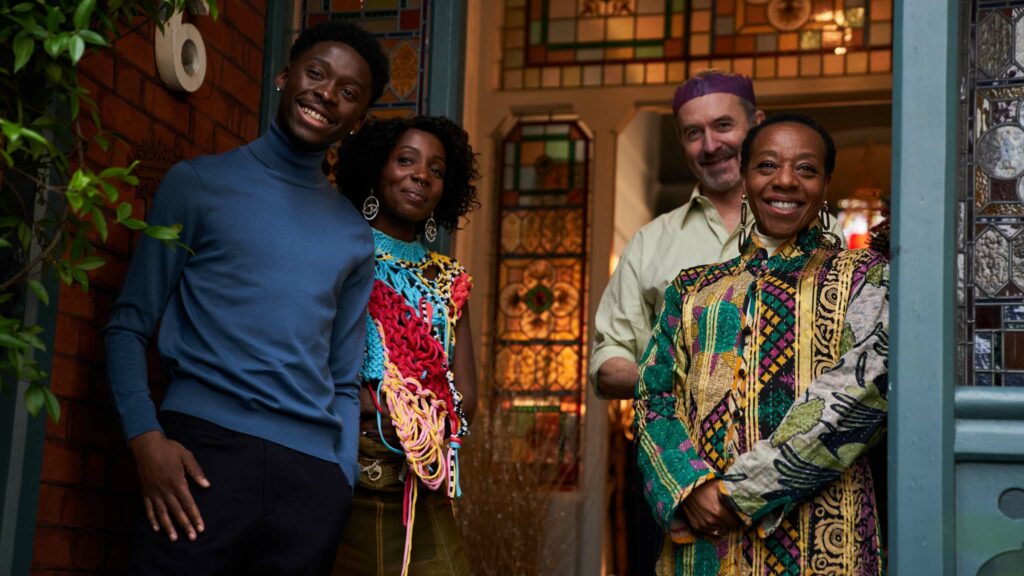 Sheyi Cole as Josh, Tamara Lawrance as Aretha, Stephen Dillane as Richard and Marianne Jean-Baptiste as Shirley in Boxing Day, directed by Aml Ameen. Photo: Laura Radford. Copyright: Warner Bros. Entertainment. All Rights Reserved.