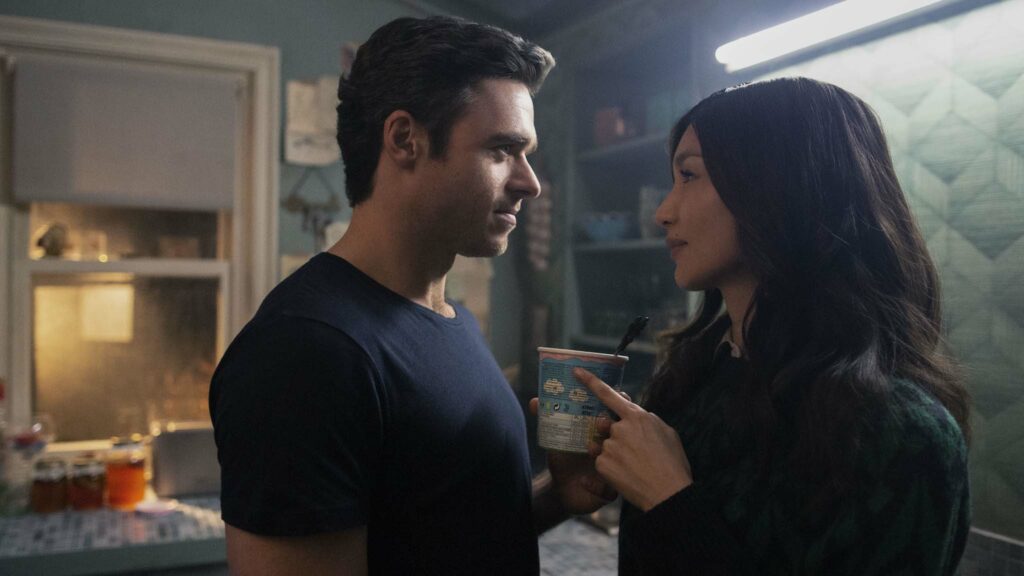 Richard Madden as Ikaris and Gemma Chan as Sersi in Marvel Studios' Eternals, directed by Chloe Zhao. Photo: Sophie Mutevelian. Copyright: 2021 Marvel Studios. All Rights Reserved.