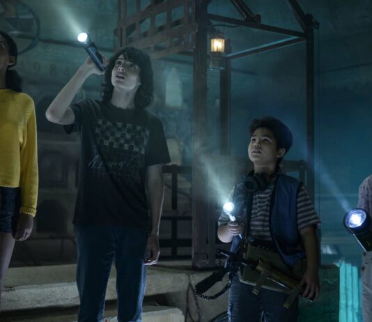 Celeste O'Connor as Lucky, Finn Wolfhard as Trevor, Logan Kim as Podcast and McKenna Grace as Phoebe in Ghostbusters: Afterlife, directed by Jason Reitman. Photo: Kimberley French. Copyright: 2021 CTMG, Inc. All Rights Reserved.