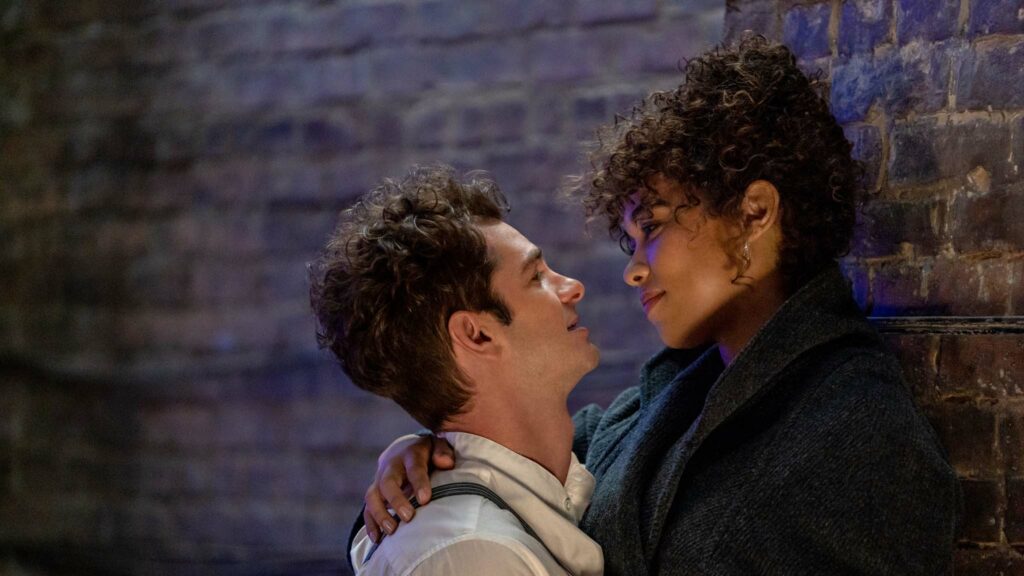 Andrew Garfield as Jonathan Larson and Alexandra Shipp as Susan in Tick, Tick… BOOM!, directed by Lin-Manuel Miranda. Photo: Macall Polay. Copyright: 2021 Netflix, Inc. All Rights Reserved.