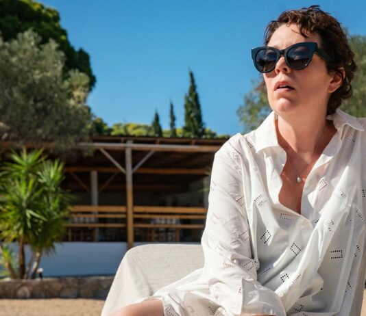 Olivia Colman as Leda in The Lost Daughter, directed by Maggie Gyllenhaal. Photo: Yannis Drakoulidis. Copyright: 2021 Netflix. All Rights Reserved.