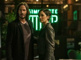 Keanu Reeves as Neo/Thomas Anderson and Carrie-Anne Moss as Trinity in The Matrix Resurrections, directed by Lana Wachowski. Photo: Murray Close. Copyright: 2021 Warner Bros. Entertainment Inc./Village Roadshow Films (BVI) Limited. All Rights Reserved.