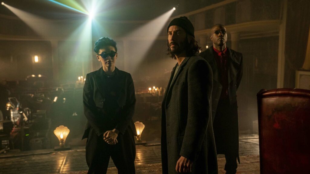 Jessica Henwick as Bugs, Keanu Reeves as Neo/Thomas Anderson and Yahya Abdul-Mateen II as Morpheus in The Matrix Resurrections, directed by Lana Wachowski. Photo: Murray Close. Copyright: 2021 Warner Bros. Entertainment Inc./Village Roadshow Films (BVI) Limited. All Rights Reserved.