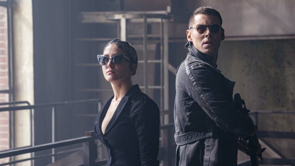 Erendira Ibarra as Lexy and Brian J Smith as Berg in The Matrix Resurrections, directed by Lana Wachowski. Photo: Murray Close. Copyright: 2021 Warner Bros. Entertainment Inc./Village Roadshow Films (BVI) Limited. All Rights Reserved.