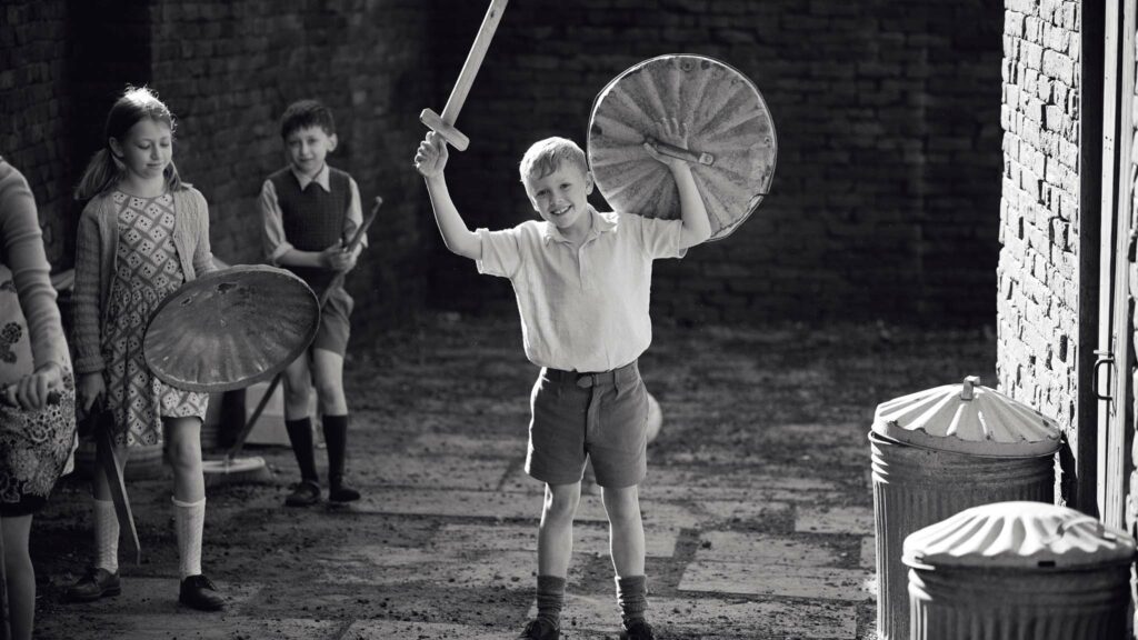 Jude Hill as Buddy in Belfast, directed by Kenneth Branagh. Photo: Rob Youngson. Copyright: 2021 Focus Features, LLC. All Rights Reserved.