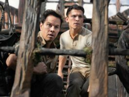 Mark Wahlberg as Victor “Sully” Sullivan and Tom Holland as Nathan Drake in Uncharted, directed by Ruben Fleischer. Photo: Clay Enos. Copyright: 2021 CTMG, Inc. All Rights Reserved.