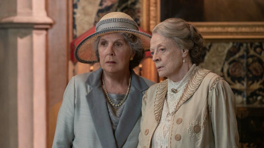 Penelope Wilton as Isobel Merton and Maggie Smith as Violet Grantham in Downton Abbey: A New Era, directed by Simon Curtis. Photo: Ben Blackall. Copyright: 2022 Focus Features, LLC. All Rights Reserved.