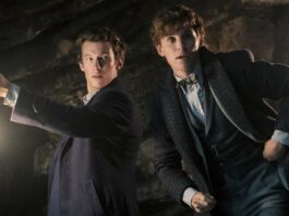 Callum Turner as Theseus Scamander and Eddie Redmayne as Newt Scamander in Fantastic Beasts: The Secrets Of Dumbledore, directed by David Yates. Photo: Jaap Buitendijk. Copyright: 2022 Warner Bros. Entertainment Inc. All Rights Reserved.