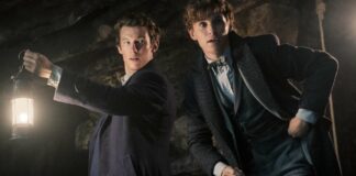 Callum Turner as Theseus Scamander and Eddie Redmayne as Newt Scamander in Fantastic Beasts: The Secrets Of Dumbledore, directed by David Yates. Photo: Jaap Buitendijk. Copyright: 2022 Warner Bros. Entertainment Inc. All Rights Reserved.