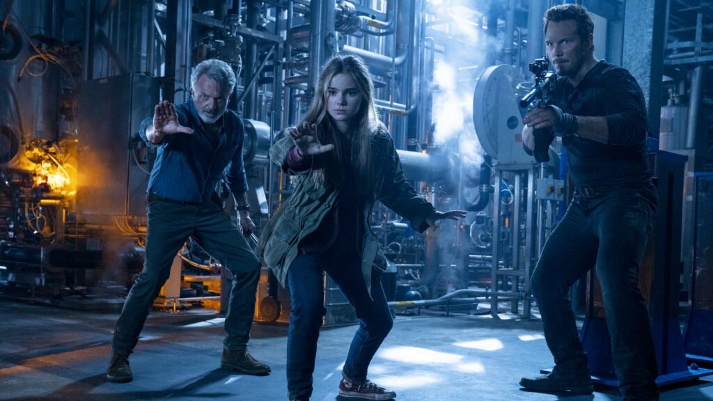 Sam Neill as Dr Alan Grant, Isabella Sermon as Maisie Lockwood and Chris Pratt as Owen Grady in Jurassic World: Dominion, directed by Colin Trevorrow. Photo: John Wilson. Copyright: 2022 Universal Studios and Amblin Entertainment. All Rights Reserved.