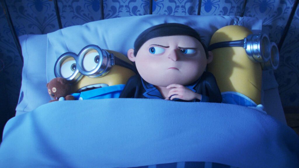 Minion Bob, Gru (voiced by Steve Carell) and Minion Kevin in Minions: The Rise Of Gru, directed by Kyle Balda, Brad Ableson and Jonathan del Val. Copyright: 2022 Universal Studios. All Rights Reserved.