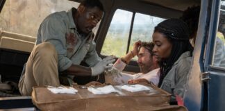 Idris Elba as Dr Nate Samuels, Sharlto Copley as Martin Battles, Iyana Halley as Meredith Samuels and Leah Sava Jeffries as Norah Samuels in Beast, directed by Baltasar Kormakur. Photo: Lauren Mulligan. Copyright: Universal Studios. All Rights Reserved.