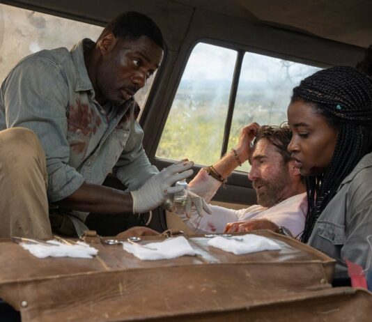 Idris Elba as Dr Nate Samuels, Sharlto Copley as Martin Battles, Iyana Halley as Meredith Samuels and Leah Sava Jeffries as Norah Samuels in Beast, directed by Baltasar Kormakur. Photo: Lauren Mulligan. Copyright: Universal Studios. All Rights Reserved.