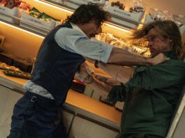 Aaron Taylor-Johnson as Tangerine and Brad Pitt as Ladybug in Bullet Train, directed by David Leitch. Photo: Scott Garfield. Copyright: 2022 CTMG. All Rights Reserved.